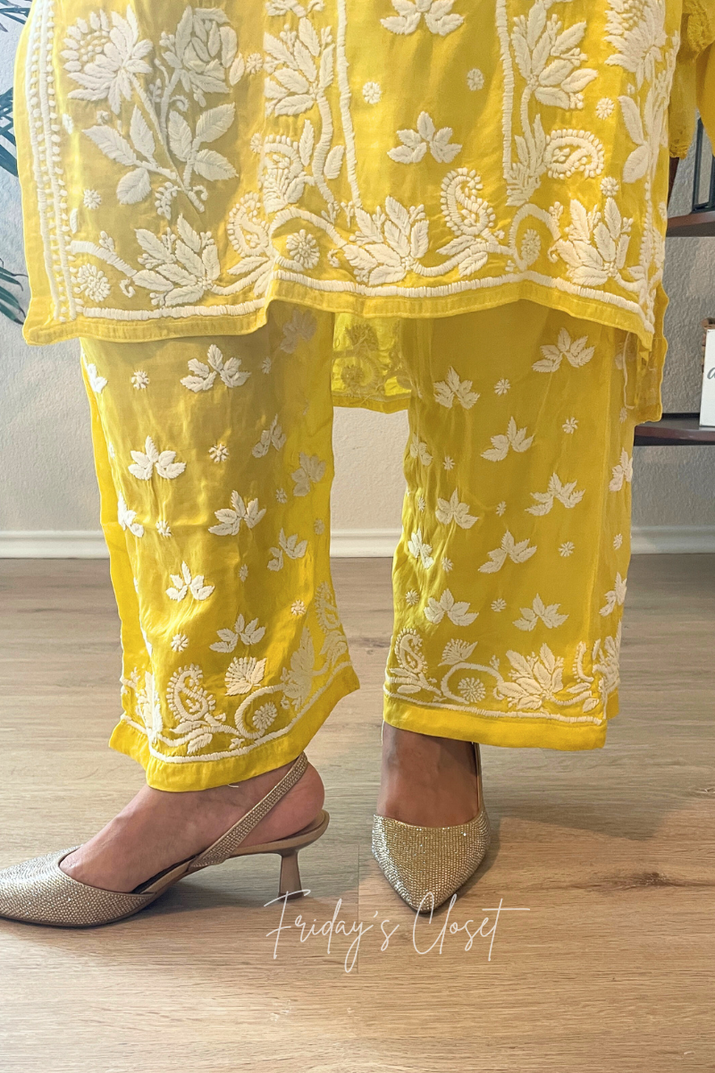 Salma lotus motif kurta set in yellow, showcasing elegant design and vibrant color with traditional embroidery.